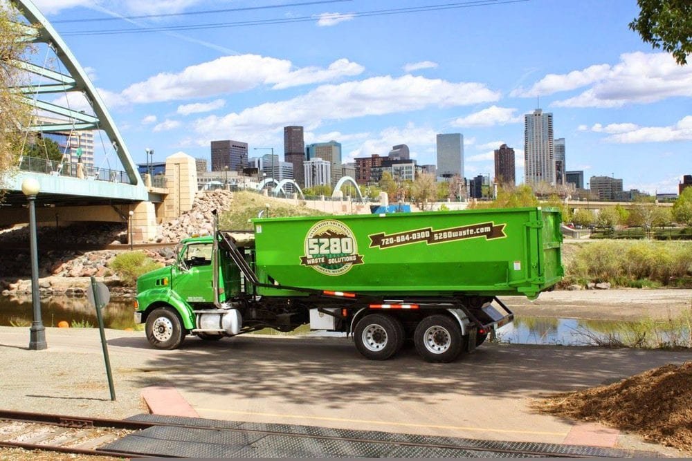 40 yard roll-off dumpster on large construction site in Denver, CO